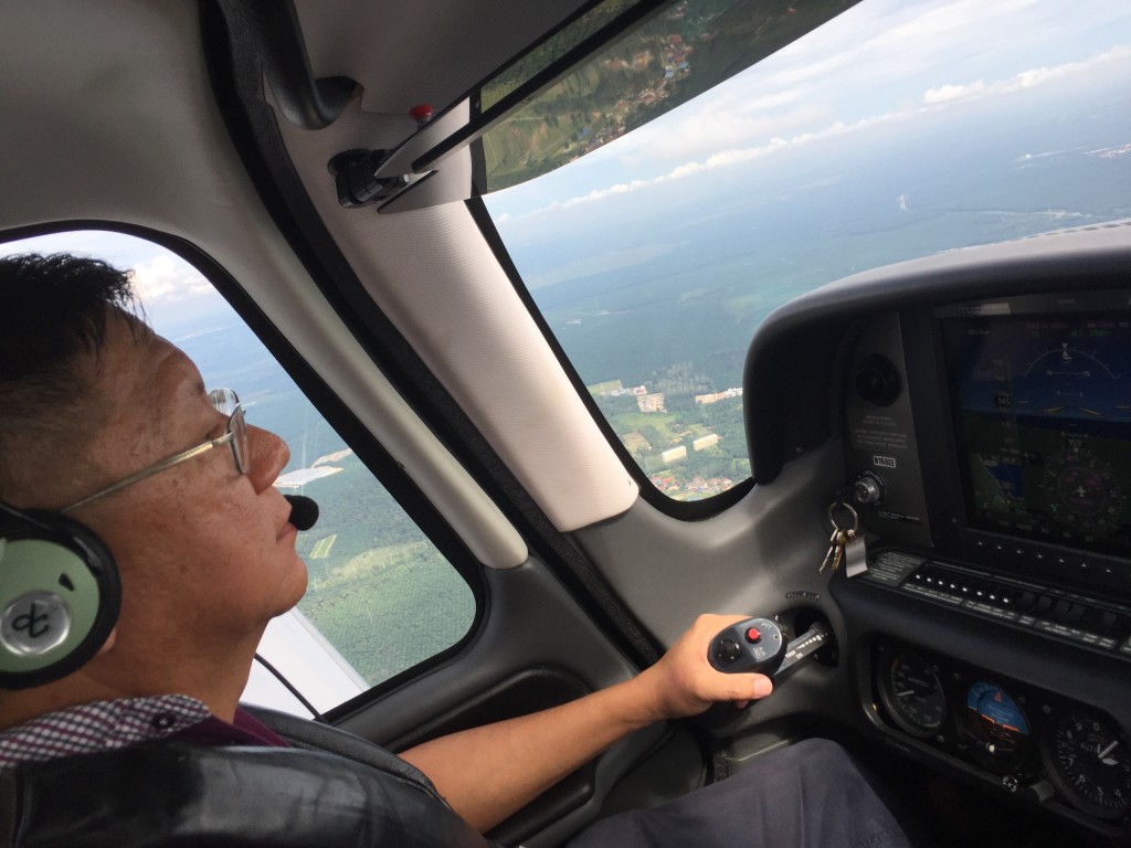 Johor Flying Club member Captain Roger Lee in a Cirrus SR22